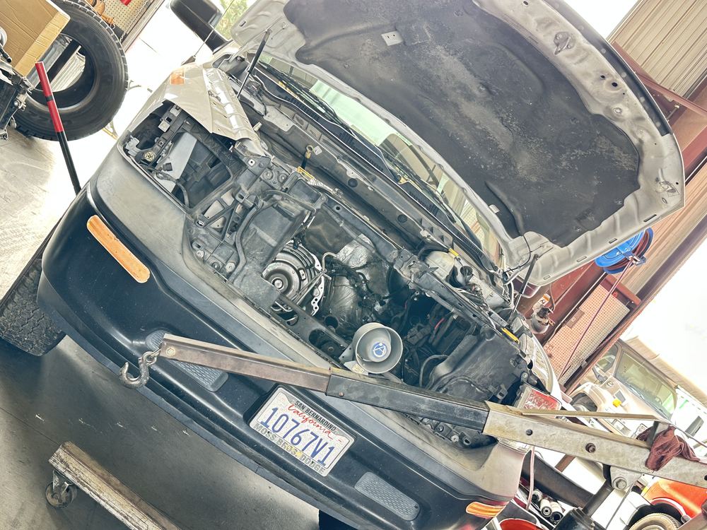 Engine bay of a truck under repair at Bonafide Truck and Equipment Repair, Cherry Valley, CA